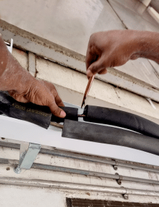 Relocation of HDB Aircon Condensing Unit - Putting gan to seal the insulation